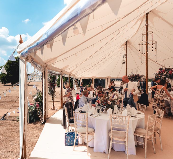 Sandhurst Military Academy Marquee Wedding With Bride In Pronovias Bridesmaids In Pink Dresses By Jarlo London Images From Peter Hughes Photography