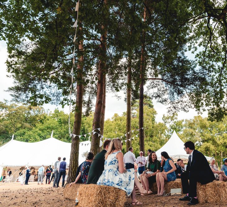 Sandhurst Military Academy Marquee Wedding With Bride In Pronovias Bridesmaids In Pink Dresses By Jarlo London Images From Peter Hughes Photography