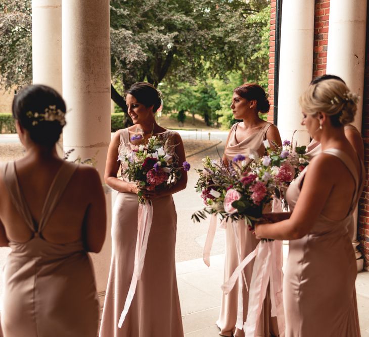 Pink Bridesmaids Dresses By Jarlo London // Image By Peter Hughes Photography