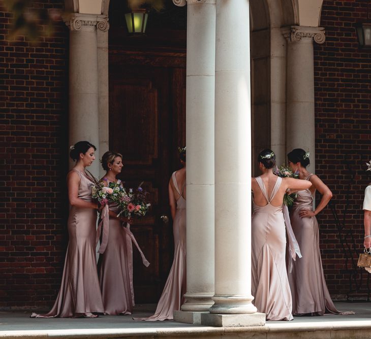 Sandhurst Military Academy Marquee Wedding With Bride In Pronovias Bridesmaids In Pink Dresses By Jarlo London Images From Peter Hughes Photography