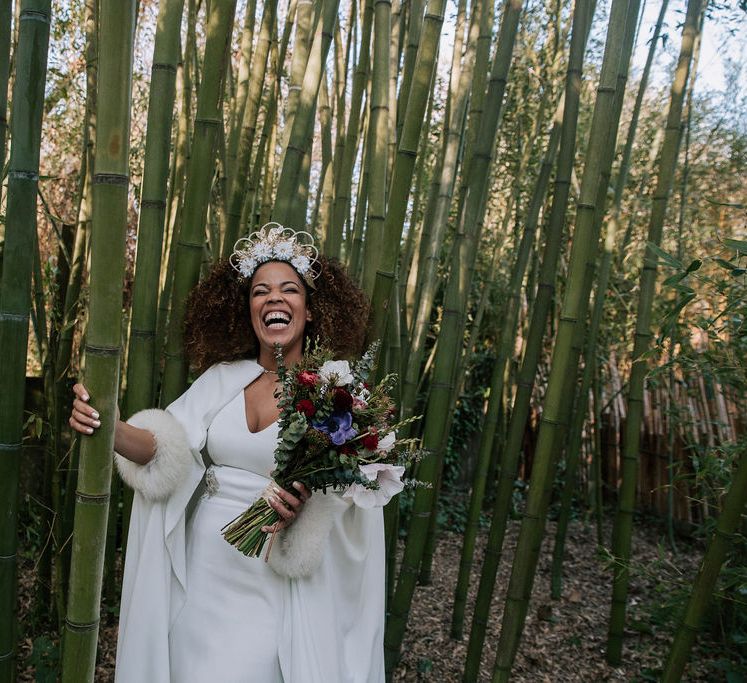 Bride in Gold Headdress, Patricia Meléndez Wedding Dress and Coat with blue fox wristband