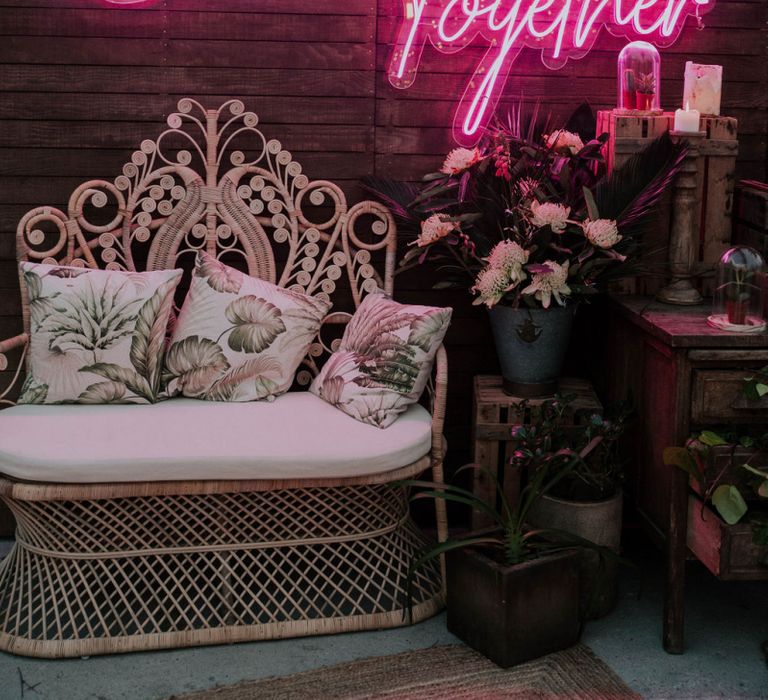 Chill-out Zone with Wicker Chair and Pink Neon Better Together Sign