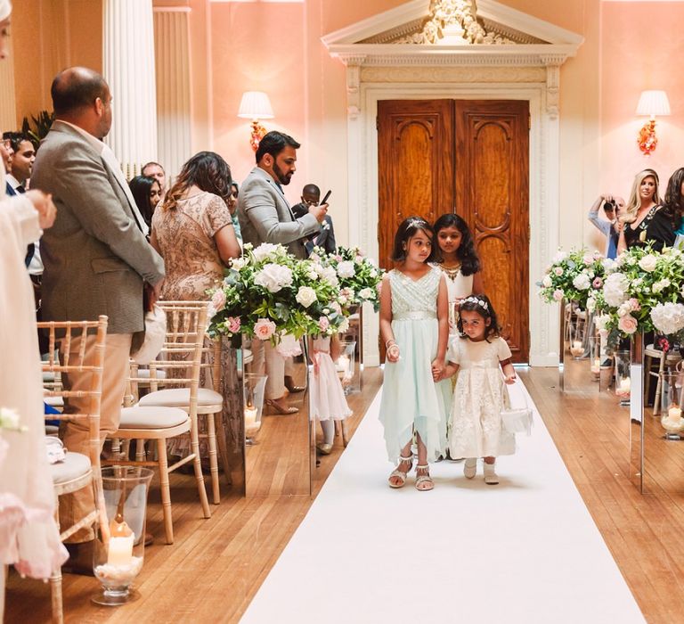 Flower Girls Walking Down The Aisle