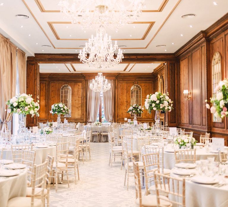 Header House, Buckinghamshire Wedding Reception with Chandelier and Tall Floral Centrepieces