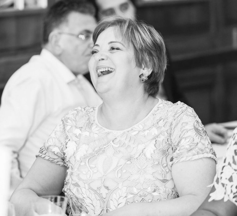 Mother of the Bride Laughing During The Wedding Reception Speeches