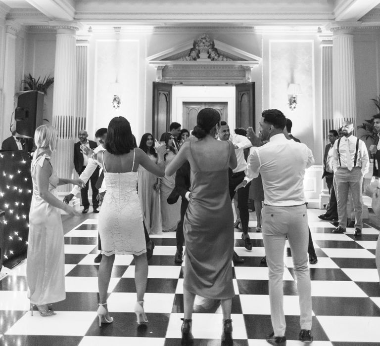 Wedding Guests Dancing During The Evening Reception