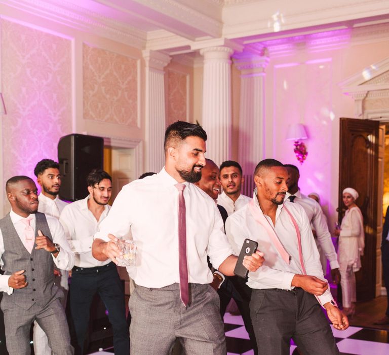 Wedding Guests Dancing During The Evening Reception