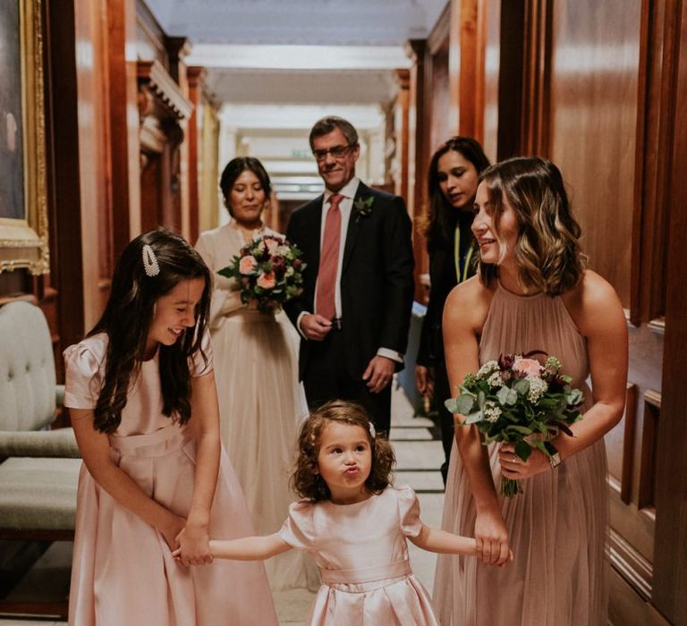 Bridesmaid and flower girls in pink dresses