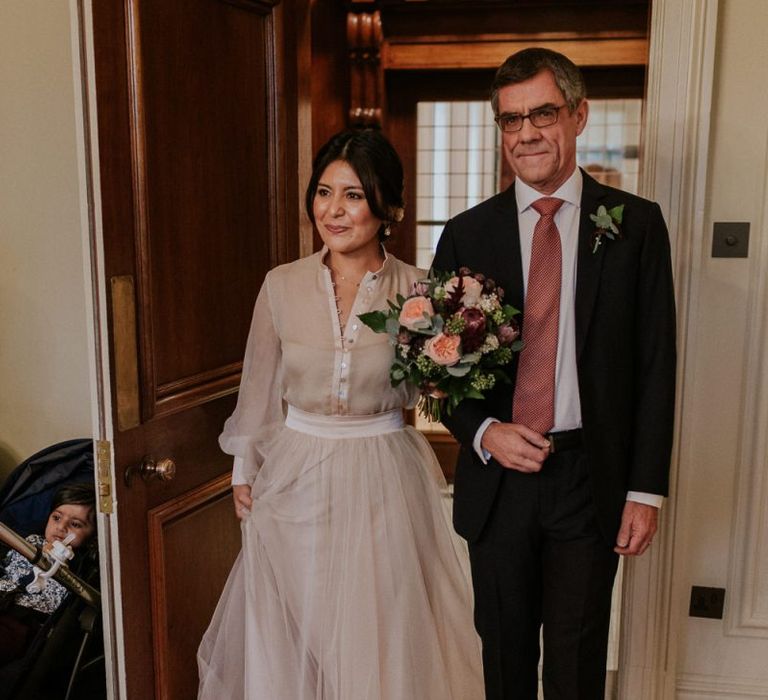 Wedding ceremony bridal entrance in tulle skirt