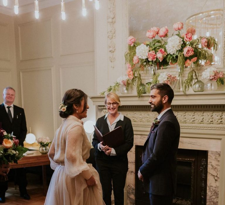 town hall wedding ceremony with bride in tulle skirt