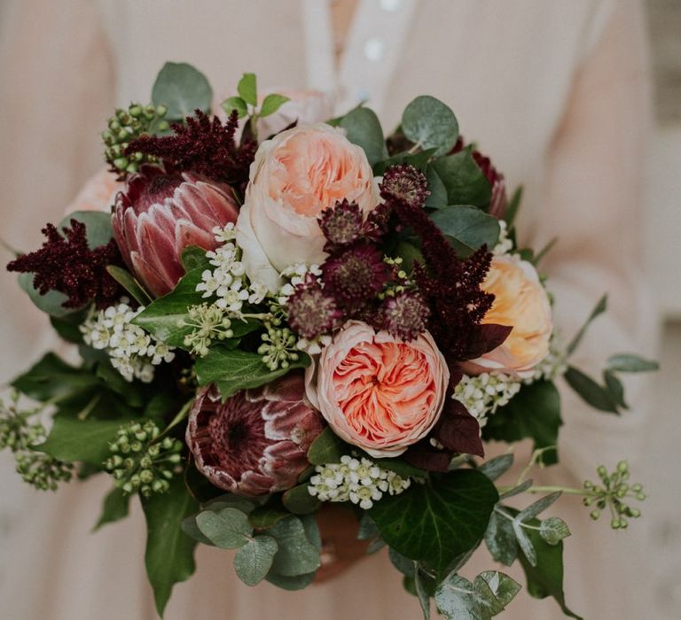 Protea, David Austin Roses and foliage wedding bouquet