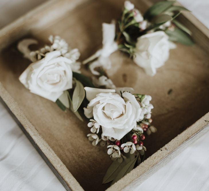 White wedding buttonholes