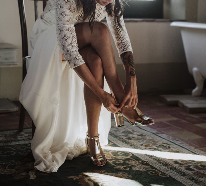 Gold wedding shoes with Laure de Sagazan bride dress