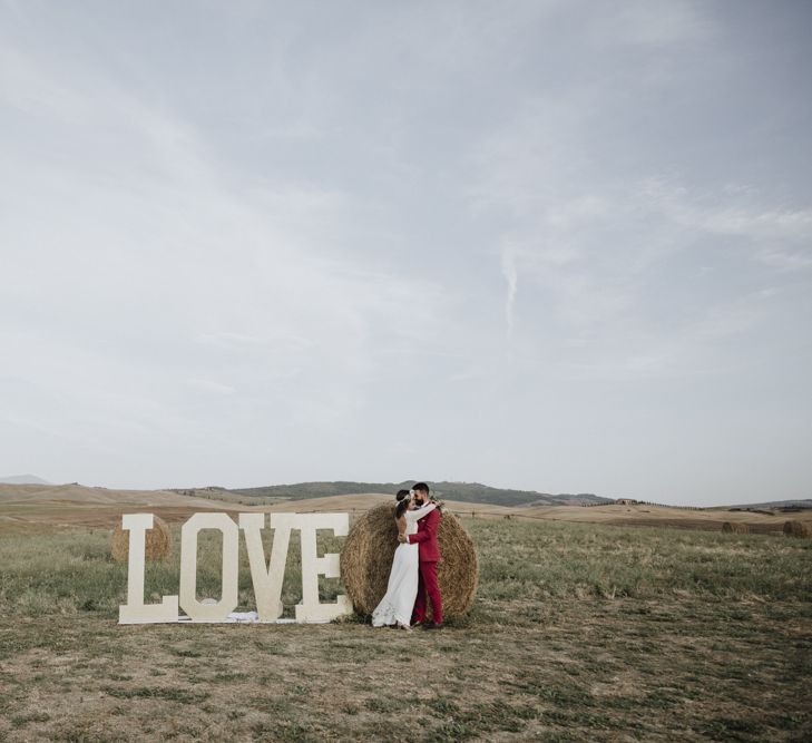 Italian wedding with large 'LOVE' letters