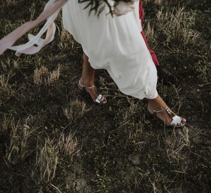 Gold wedding shoes with Laure de Sagazan dress