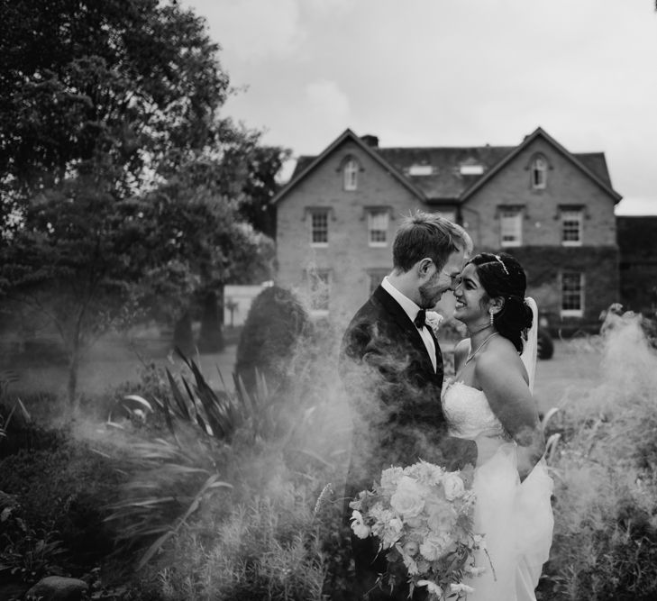 Bride and groom smoke bomb portrait by Kazooieloki Photography