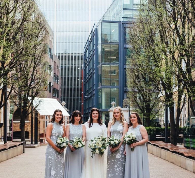 Bride wearing two piece dress and her bridesmaids at  Devonshire Terrace