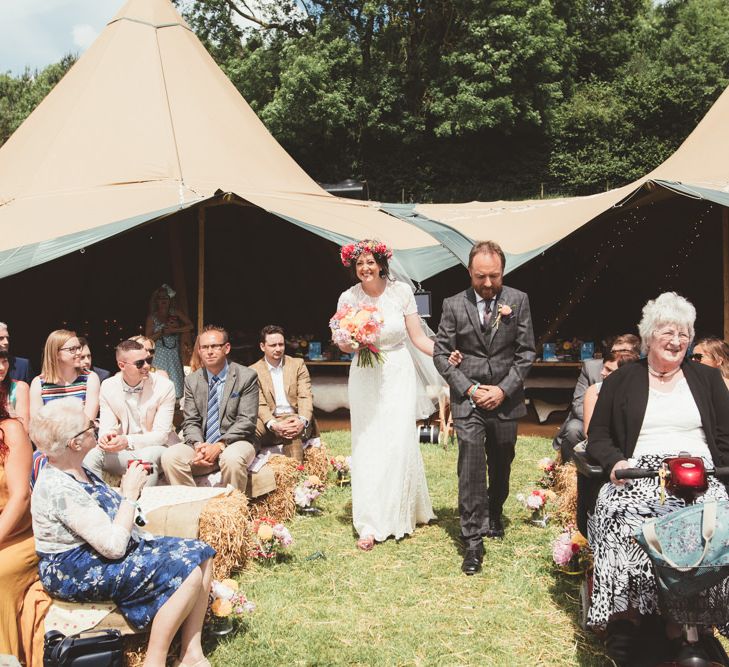 Wedding Ceremony | Bridal Entrance in Lace Watters Gown &amp; Colourful Flower Crown | Bright Festival Themed Outdoor Ceremony &amp; Tipi Weeding |  Maryanne Weddings | Framed Beauty Film