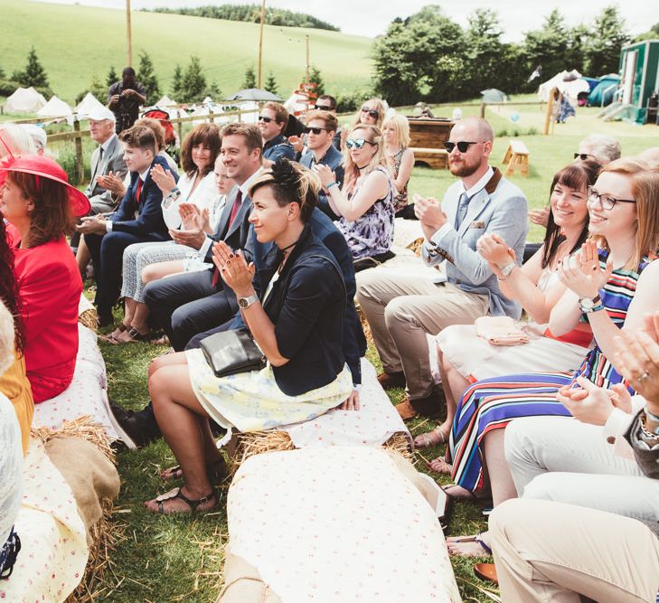 Hay Bale Seating Area | Bright Festival Themed Outdoor Ceremony &amp; Tipi Weeding |  Maryanne Weddings | Framed Beauty Film