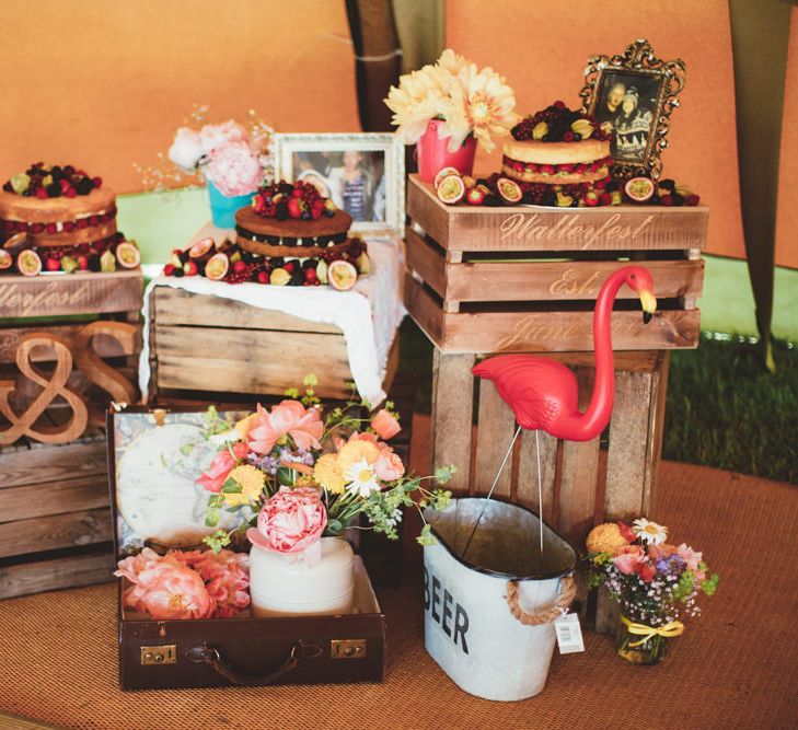 Wooden Crate Homemade Cake Table | Bright Festival Themed Outdoor Ceremony &amp; Tipi Weeding |  Maryanne Weddings | Framed Beauty Film