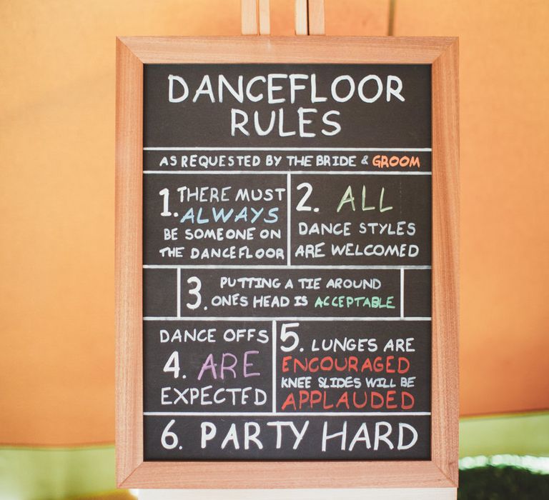 Chalkboard Dance Floor Rules Wedding Sign | Bright Festival Themed Outdoor Ceremony &amp; Tipi Weeding |  Maryanne Weddings | Framed Beauty Film