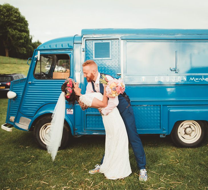 Bride in Lace Watters Wedding Dress | Groom in Navy Suit | Bright Festival Themed Outdoor Ceremony &amp; Tipi Weeding | Maryanne Weddings | Framed Beauty Film