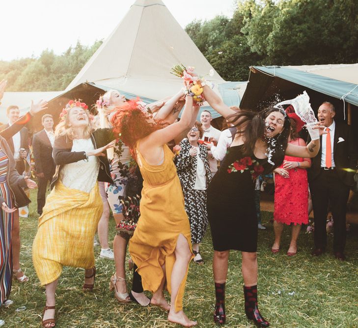 Bouquet Toss | Bright Festival Themed Outdoor Ceremony &amp; Tipi Weeding | Maryanne Weddings | Framed Beauty Film