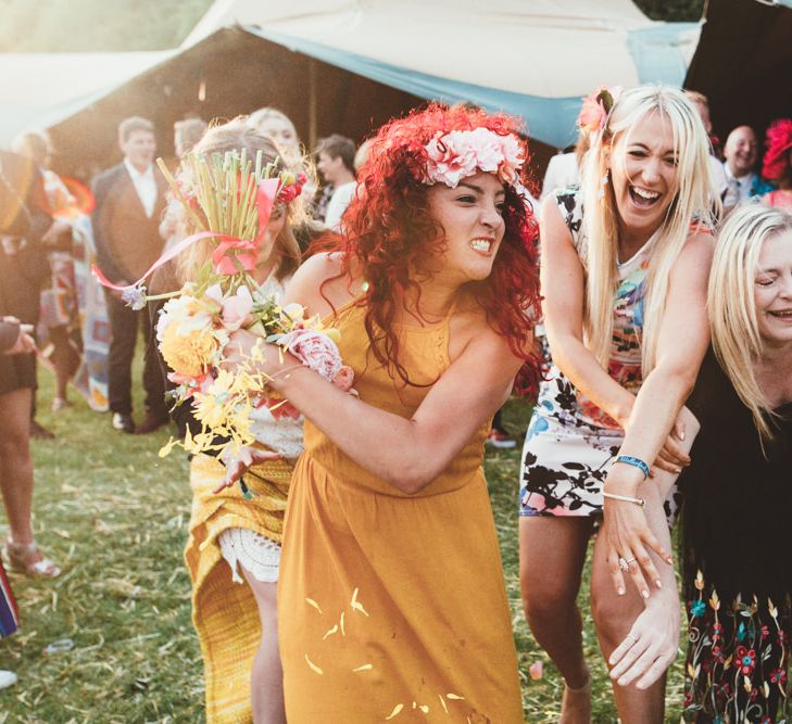 Bouquet Toss | Bright Festival Themed Outdoor Ceremony &amp; Tipi Weeding | Maryanne Weddings | Framed Beauty Film