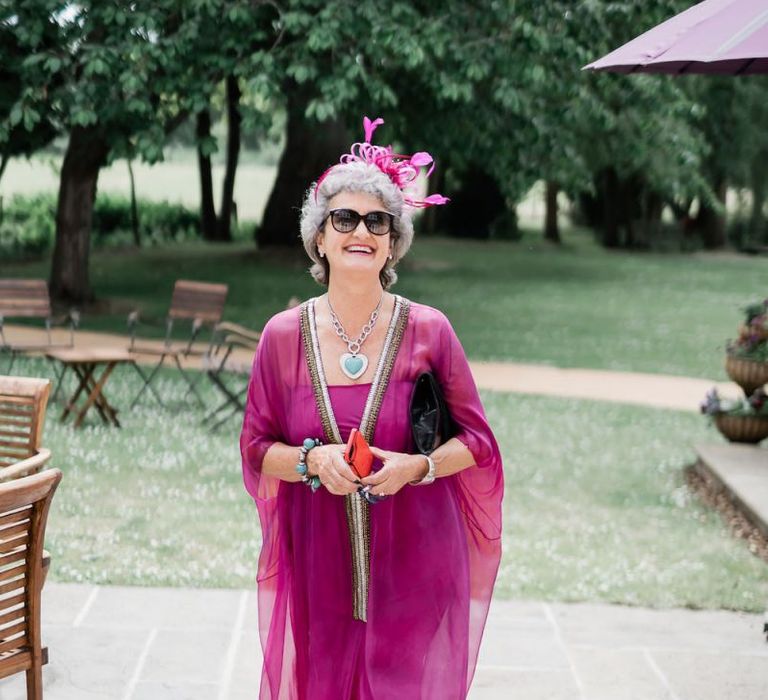 Stylish Wedding Guest in Fushia Pink Outfit