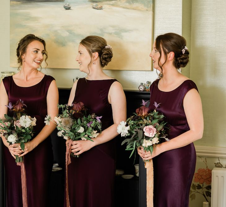 Bridesmaids in Purple Satin Dresses on the Wedding Morning