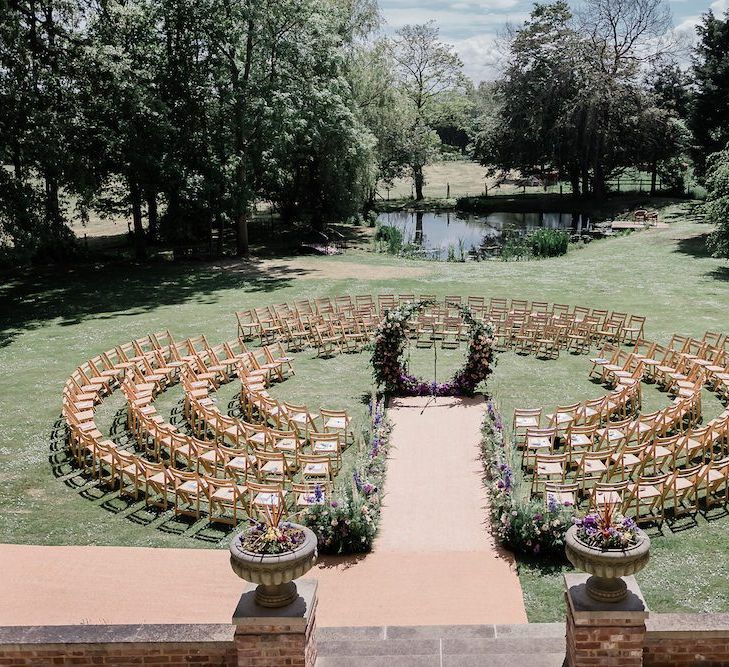 Circular Outdoor Wedding Ceremony with the Floral Moon Gate in the Centre