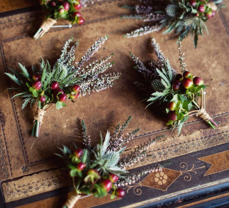 Groomsmen Buttonholes with Berries and Thistles