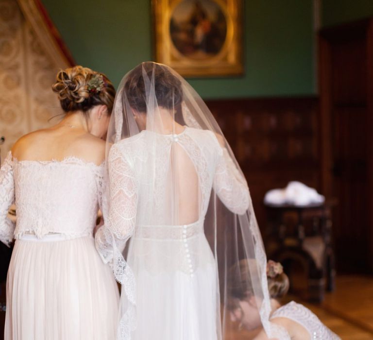 Wedding Morning Bridal Preparations with Bridesmaids in Pink Monsoon Dresses and Bride in Lihi Hod Sophia Wedding Dress