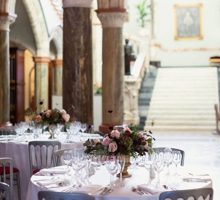 Round Wedding Reception Tables with Winter Flower Centrepieces at Mount Stuart  in Scotland