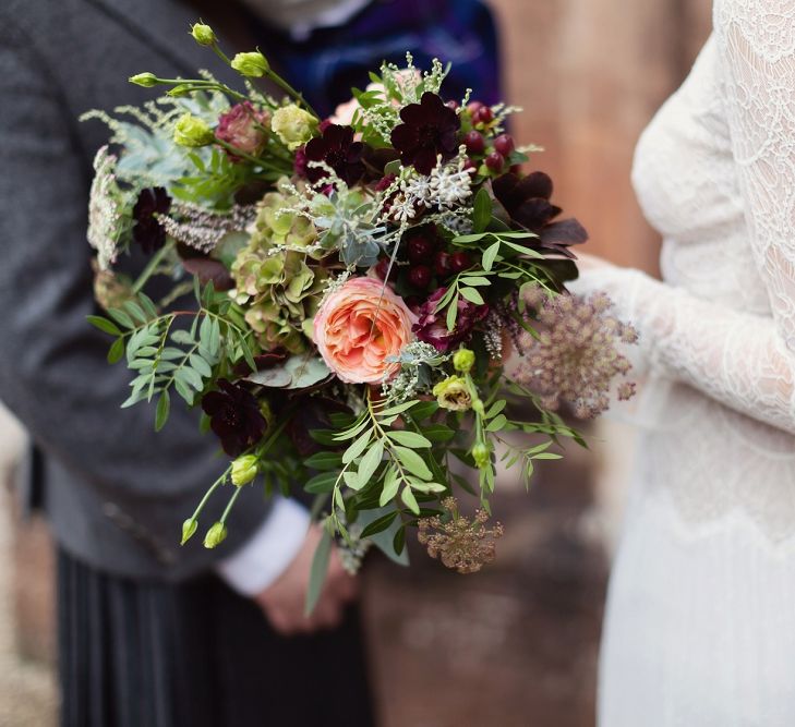 Winter Wedding Bouquet with Foliage, Hydrangea and Deep Purple Flowers