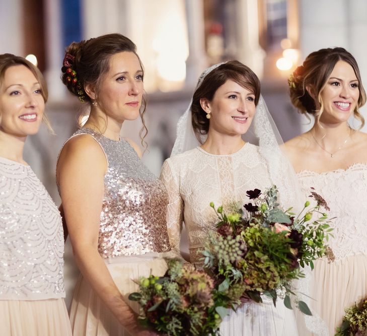 Bridal Party Portrait with Bridesmaids in Blush Monsoon Dresses and Separates and Bride in Lace Lihi Hod Sophia Wedding Dress