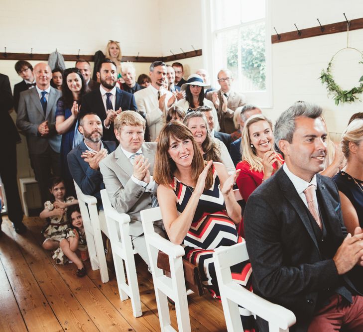 Wedding Guests Clapping During Wedding Ceremony