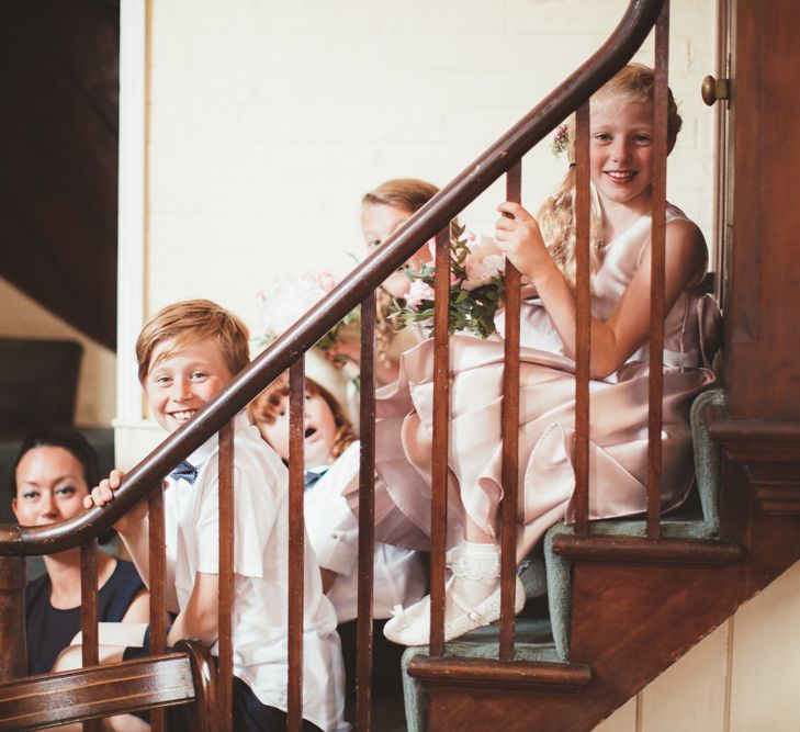 Flower Girls and Page Boys Sitting on the Stairs