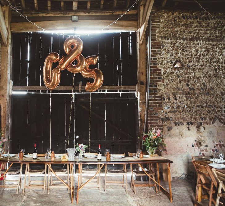 Montague Farm Barn Wedding Reception Decor with Copper Foil Balloons