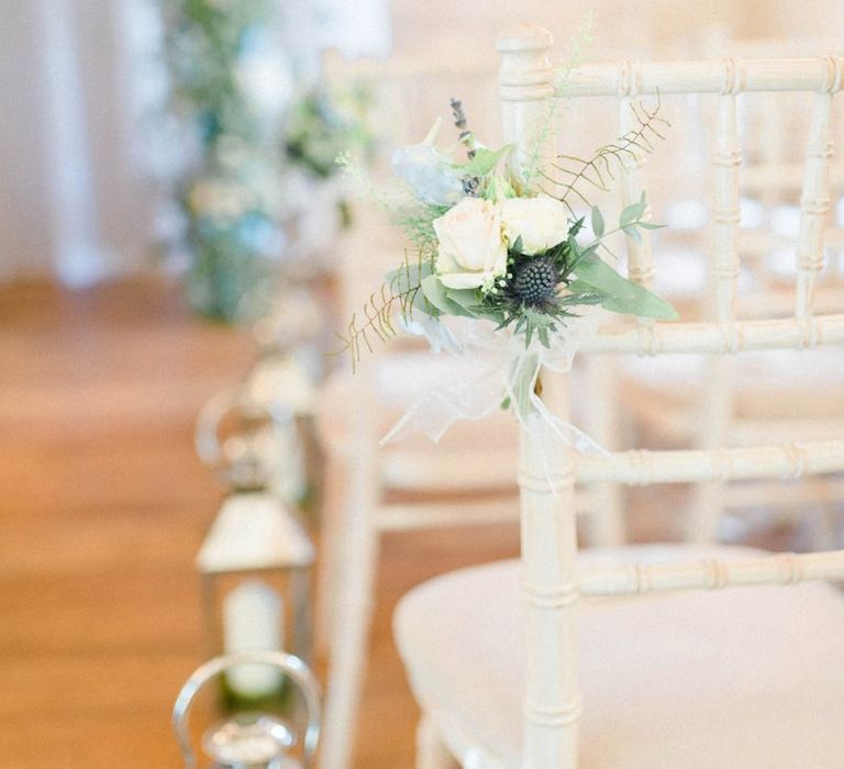 Aisle Chairs with White and Blue Wedding Flowers