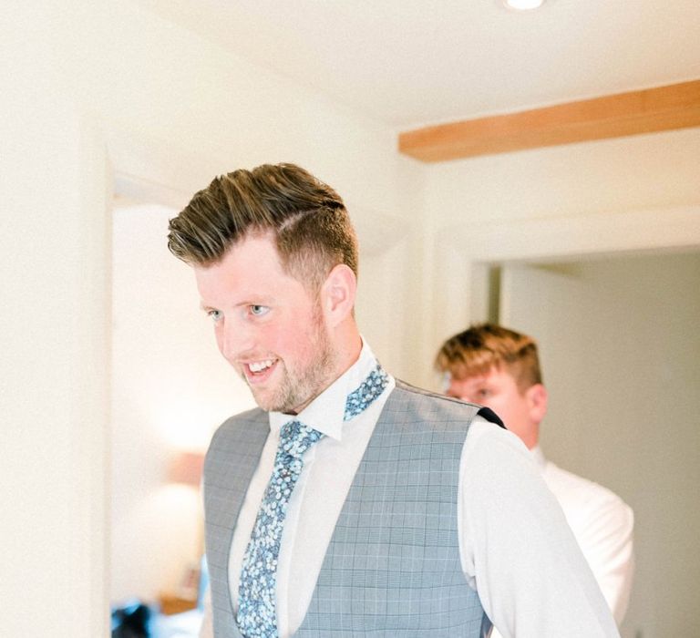 Groom in Blue Check Suit and Horseshoe Waistcoat