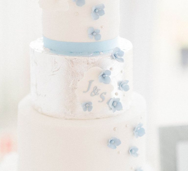 Blue and White Wedding Cake with Hydrangea Petal Design