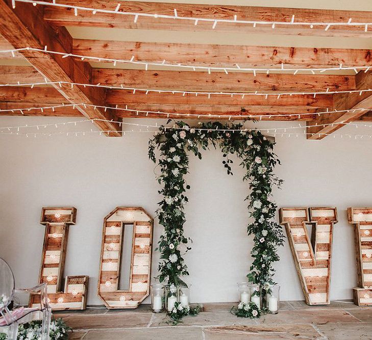 Aisle Style | Floral Arch | Giant Light Up LOVE Letters | Blush, Rustic Luxe Wedding at Ever After, Dartmoor | Dan Ward Photography | CupcakeVideos