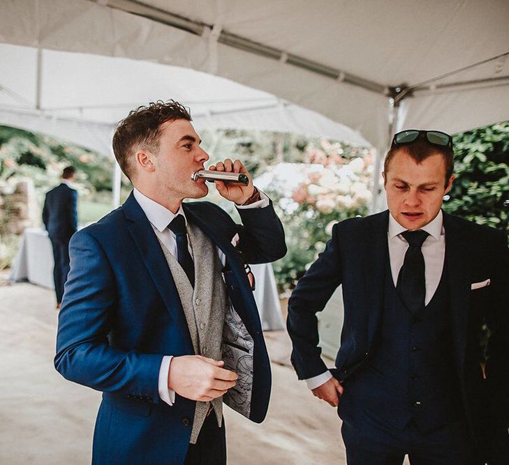 Groom in Navy Remus Uomo Suit &amp; Grey Waistcoat | Blush, Rustic Luxe Wedding at Ever After, Dartmoor | Dan Ward Photography | CupcakeVideos