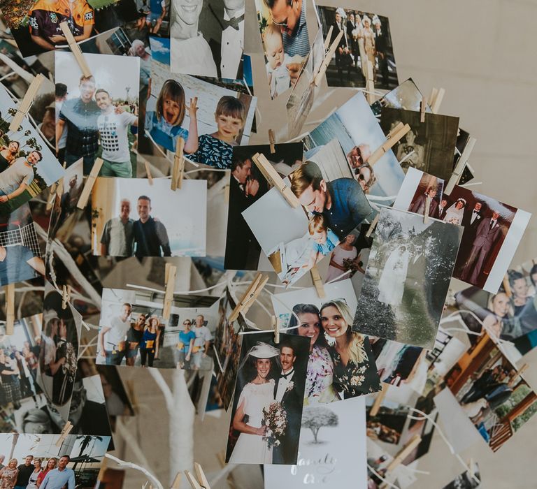 Family Photo Display For Wedding // Scottish Wedding With Ceilidh At Axnoller Dorset With Bohemian Styling Outdoor Wedding Ceremony With Images From Paul Underhill Dorset Wedding Photographer