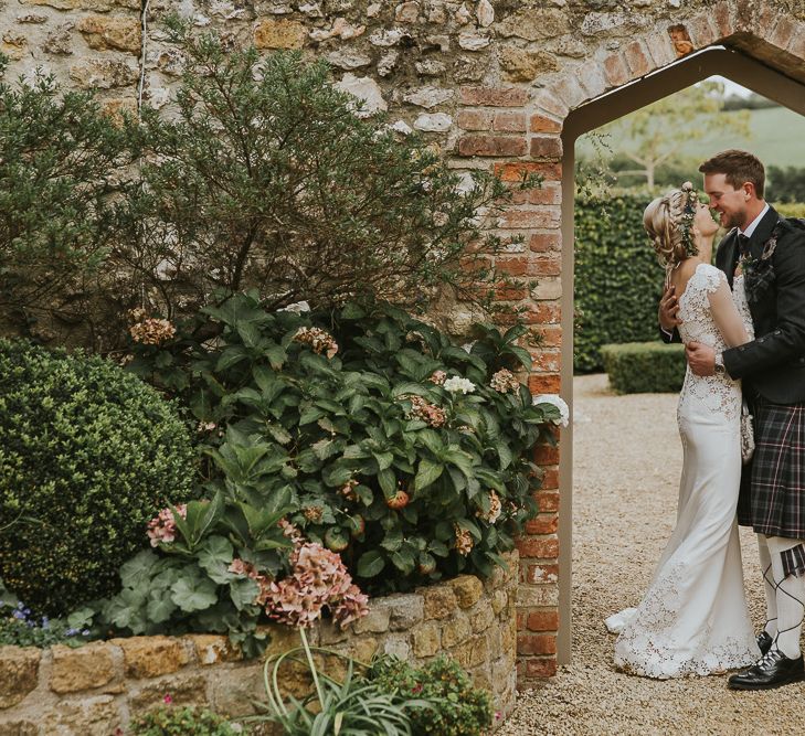 Groom In Kilt // Scottish Wedding With Ceilidh At Axnoller Dorset With Bohemian Styling Outdoor Wedding Ceremony With Images From Paul Underhill Dorset Wedding Photographer