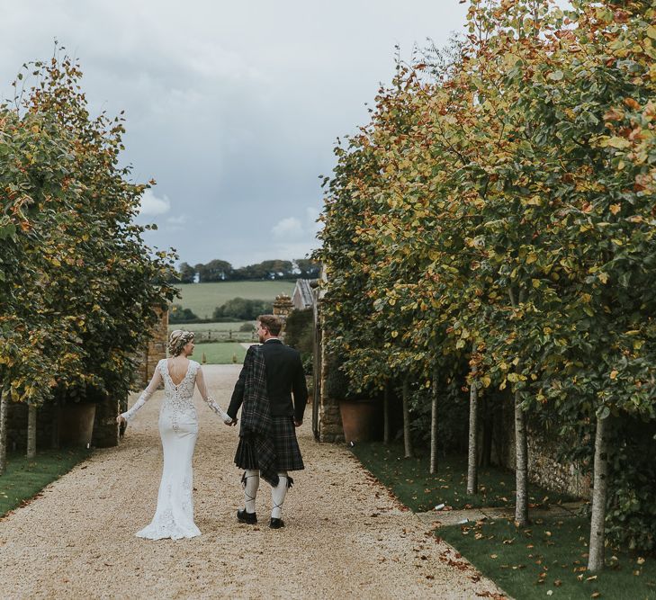 Groom In Kilt // Scottish Wedding With Ceilidh At Axnoller Dorset With Bohemian Styling Outdoor Wedding Ceremony With Images From Paul Underhill Dorset Wedding Photographer