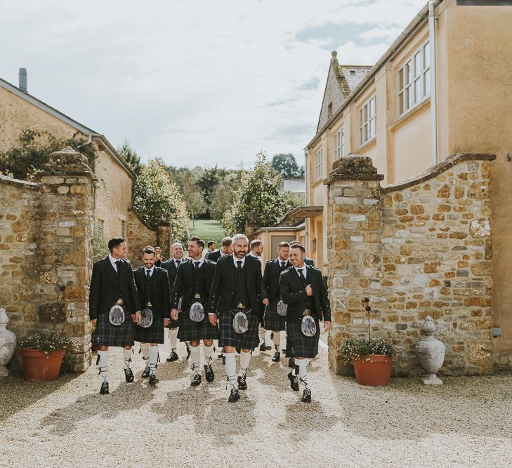 Groom &amp; Groomsmen In Kilts // Scottish Wedding With Ceilidh At Axnoller Dorset With Bohemian Styling Outdoor Wedding Ceremony With Images From Paul Underhill Dorset Wedding Photographer