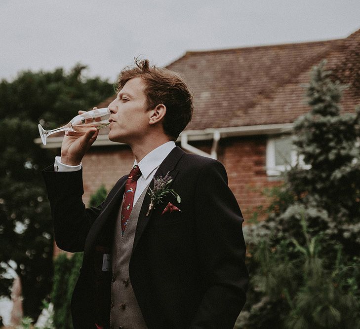 Groom in Henry Herbert Tailors Suit | English Country Garden Marquee Wedding at the Family Home on the Isle of Wight | Jason Mark Harris Photography