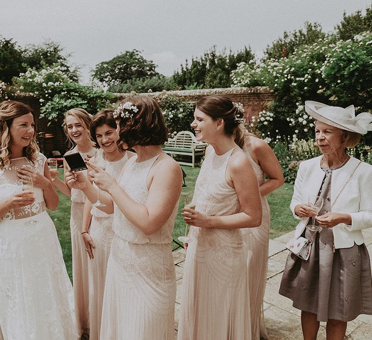 Wedding Morning Bridal Preparations | Bridesmaids in Pink Monsoon Dresses | Bride in Rime Arodaky Gown | English Country Garden Marquee Wedding at the Family Home on the Isle of Wight | Jason Mark Harris Photography